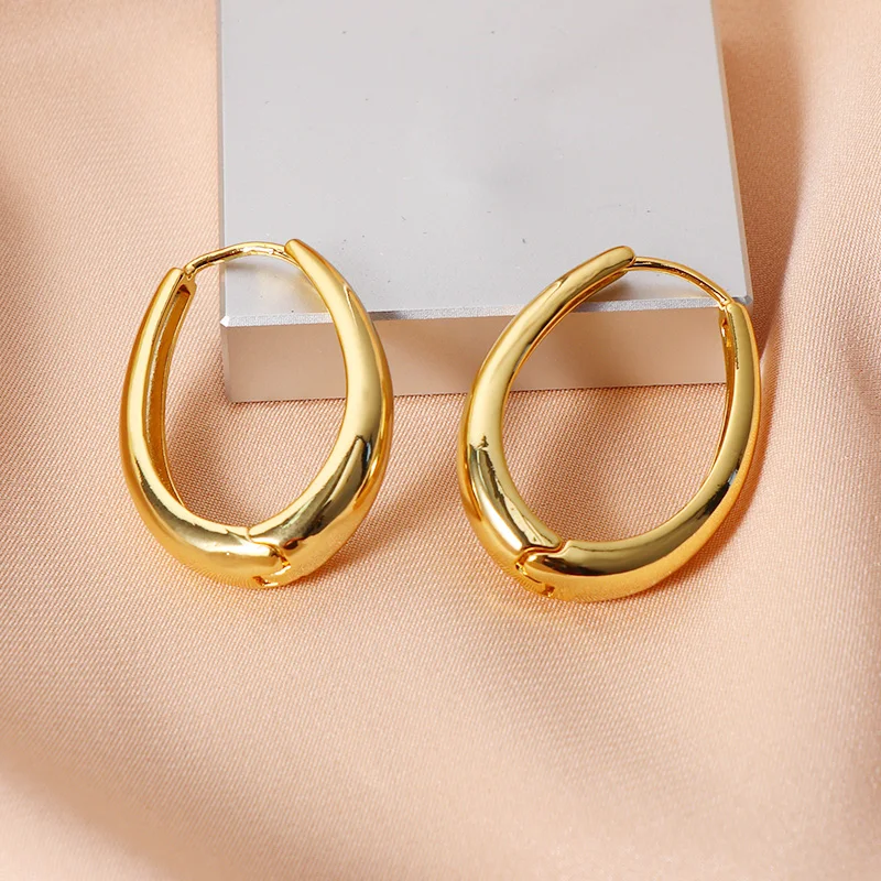 

Minimalist Gold Plated Water Drop Huggie Earrings High Polished Tear Drop Oval Hoop Earrings For Ladies