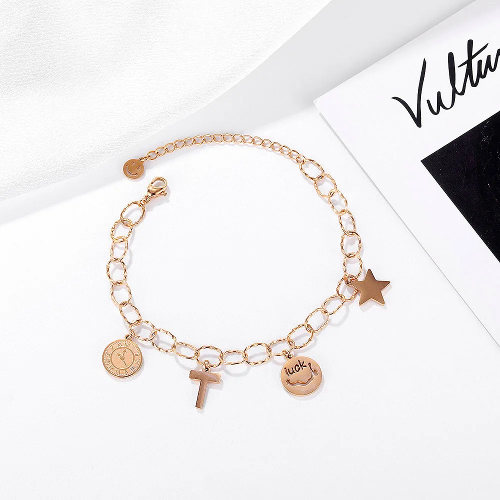 

Designer charm smiley cross star compass link chain gold plated stainless steel bracelet for women