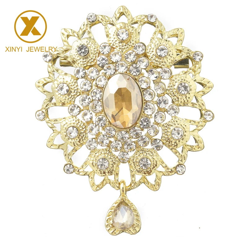 

The latest fashion jewelry brooch is a champagne rhinestone brooch for attractive women, Gold and silver