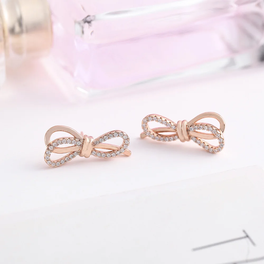 

Female Luxury European Exquisite Design Rose Gold Plated Shiny CZ Micro Paved Bowknot Stud Earring, Picture
