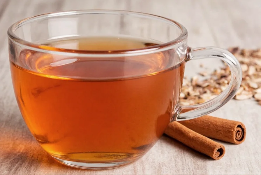 Homemade cinnamon spice tea in a ceramic mug with cinnamon sticks