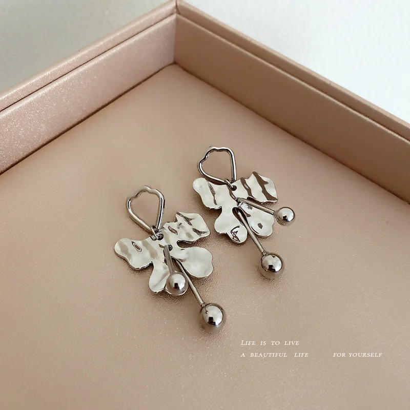 

fashion asymmetric drop earring stand metal