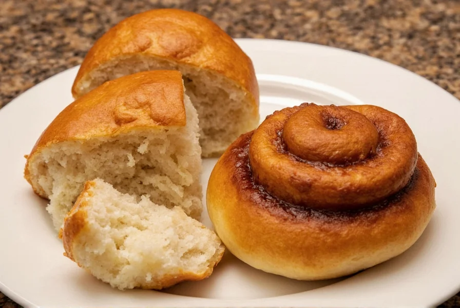 Close-up of perfectly layered legendary cinnamon roll with steam rising and cream cheese icing drizzled