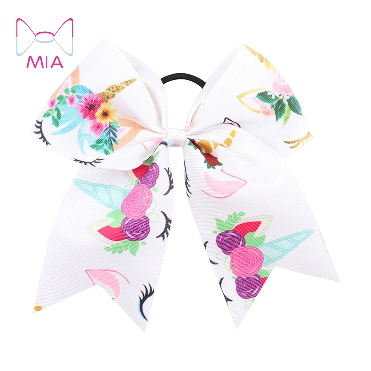 

Free Shipping  unicorn print dovetail cheer leader hair bow with hair band, Picture shows