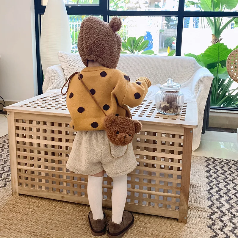 handbag with teddy bear