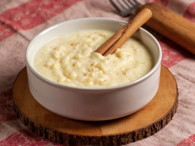 Creamy rice pudding in ceramic bowl with cinnamon
