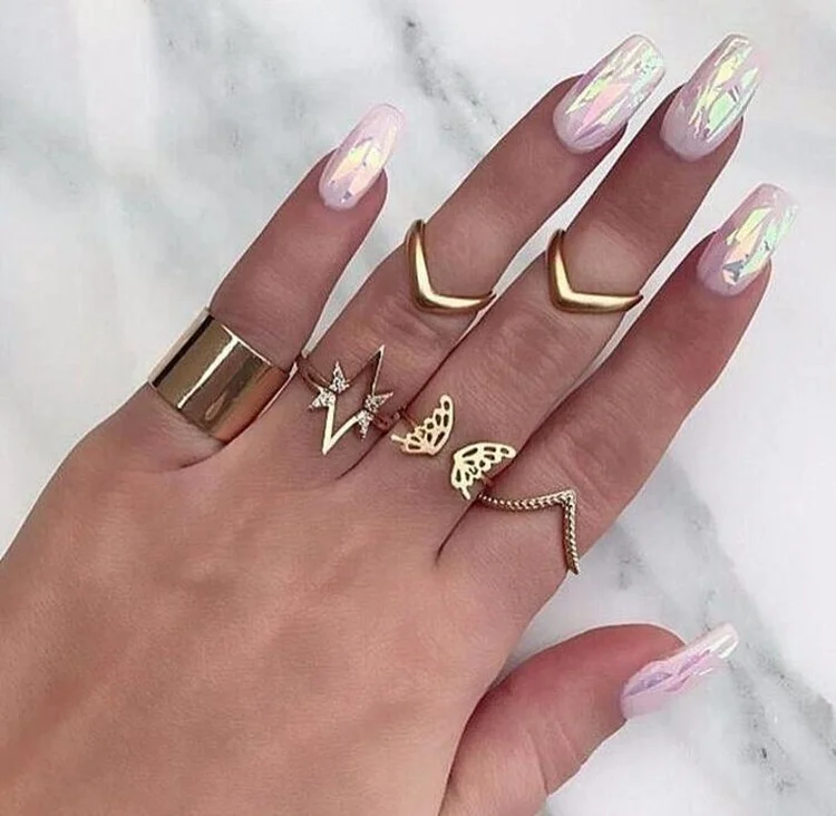 

7PCS Fashion Trend Metal Hollow Gold Spray Butterfly V Shape Ring Set