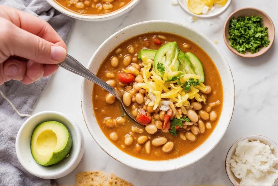 Serving crockpot white bean chicken chili with garnishes and sides