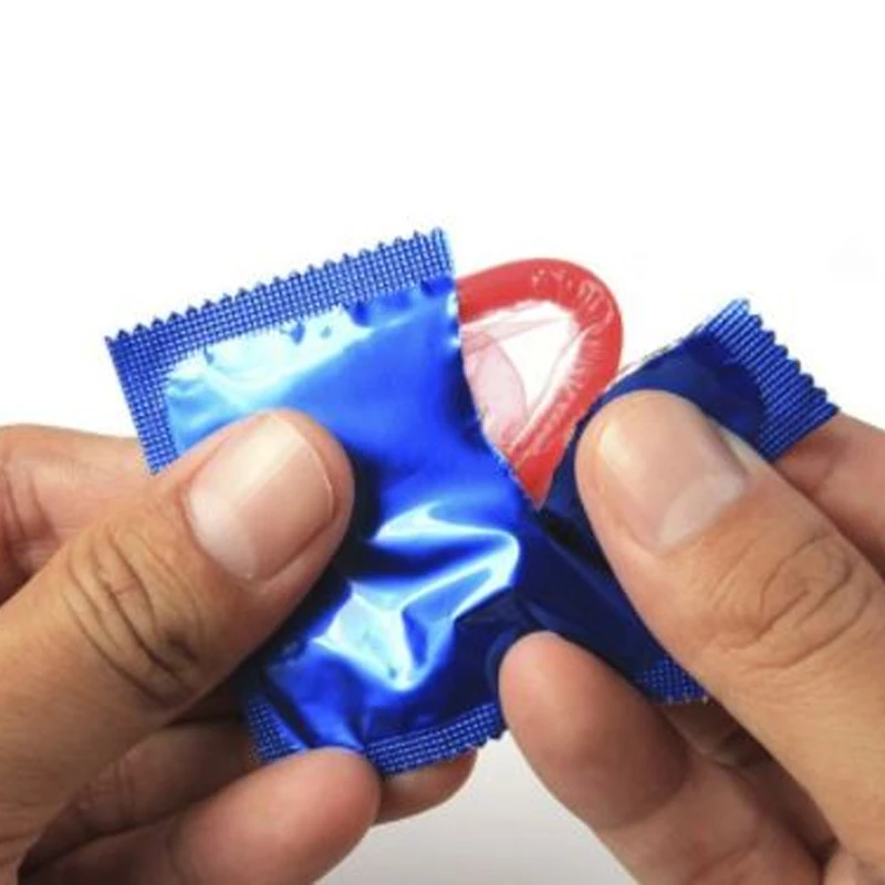 презервативы в розовой упаковке. упаковка от презерватива. презики быстро. презервативы дюрекс для него и для нее. презики быстро.