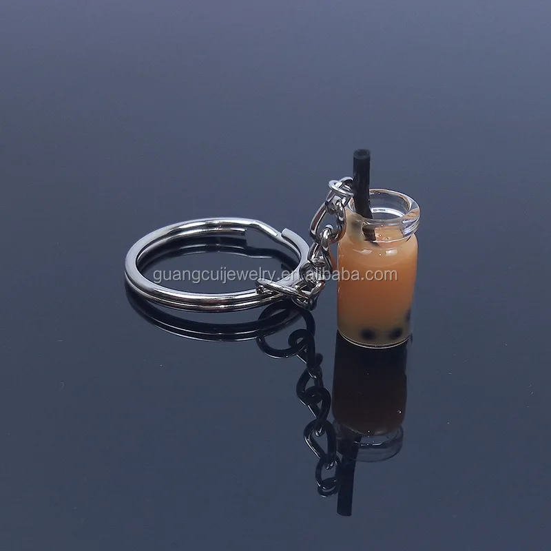 
GCK17-611Yiwu Guangcui Wholesale custom 3d mini sublimation milk glass bottle jar keychain 