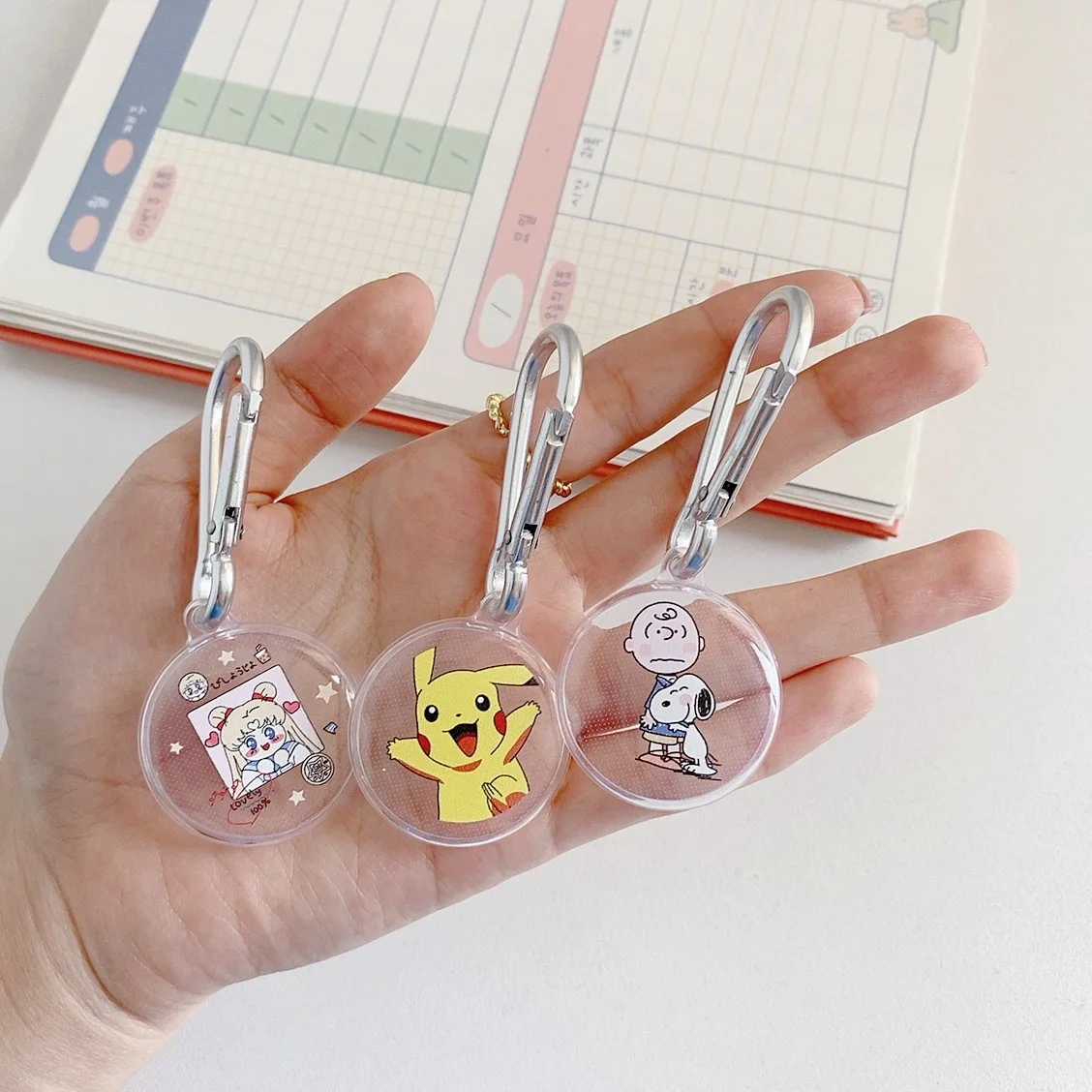 

Wholesale Cute Cartoon Transparent Clear Case For Apple AirTag Case Protective cover For Airtag case, 12colors