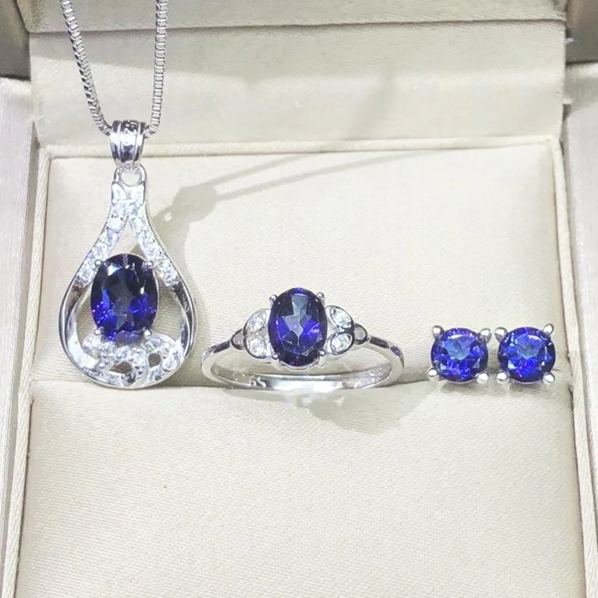 

Hot Selling 925 Sterling Silver Jewelry Rhodium Plated Jewelry Tanzanite Topaz Gem Set