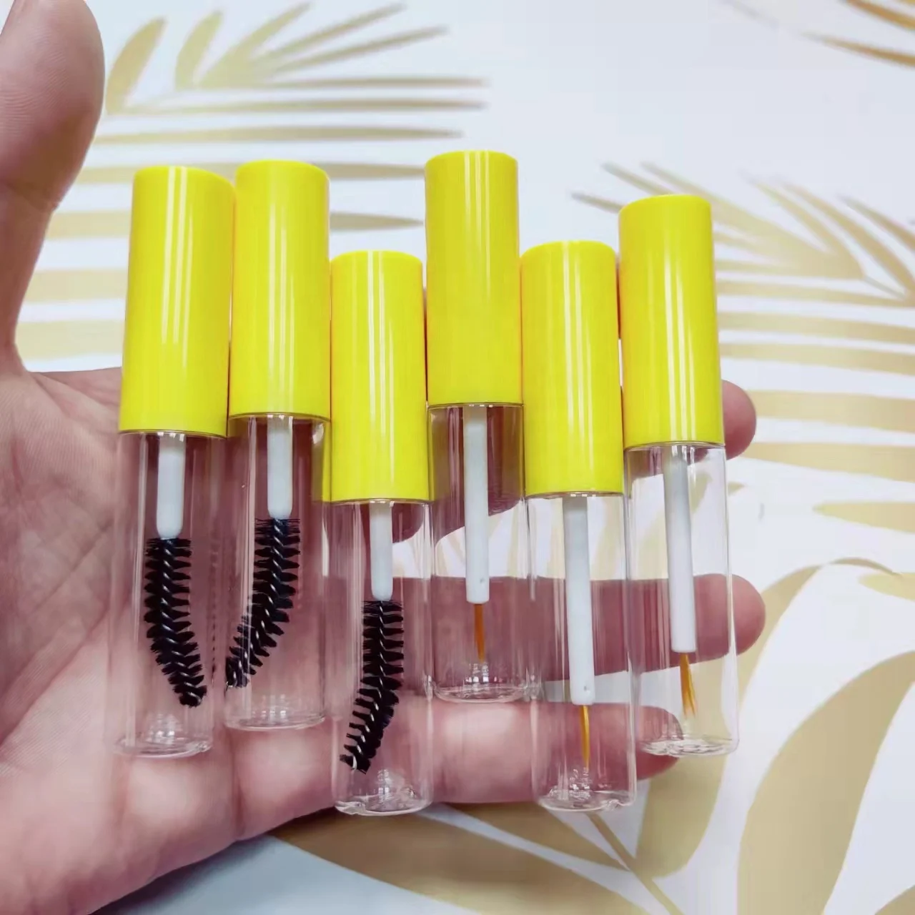 

Custom Logo Plastic Round Yellow Mascara Tube With Brush Empty Liquid Eyelash Bottle Tube Eyeliner Container