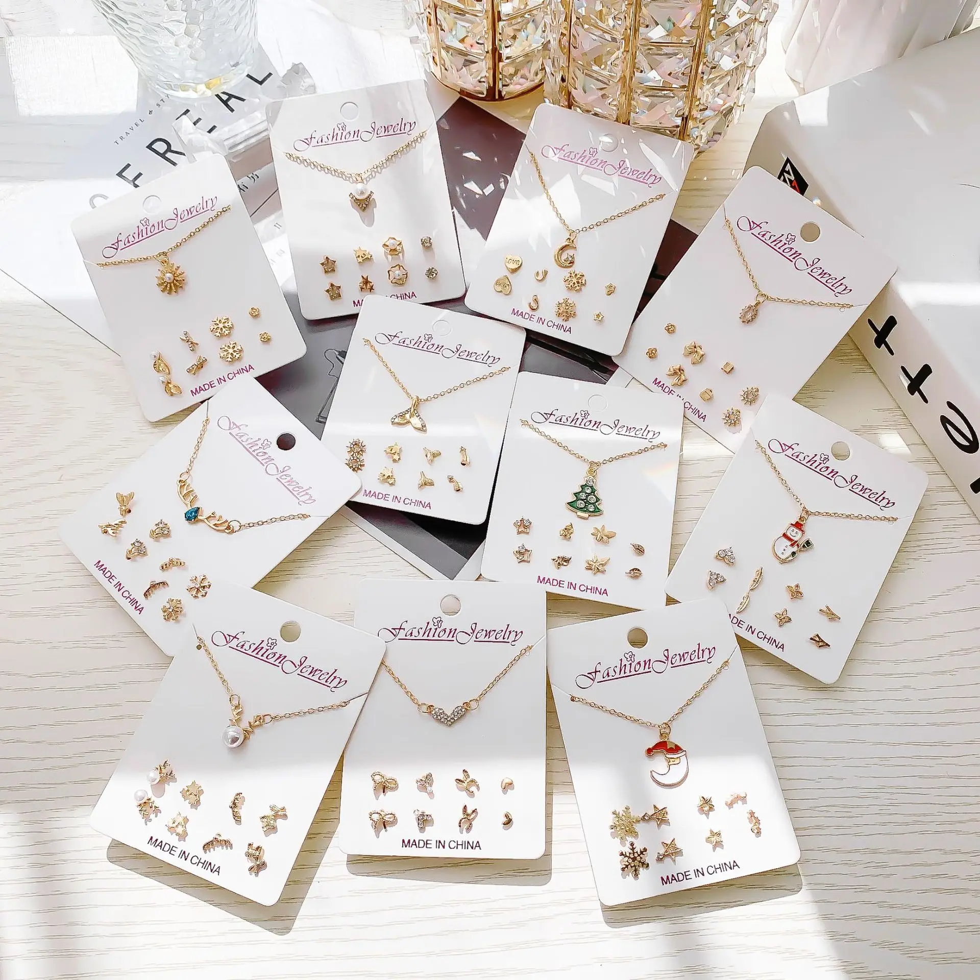 

Crystal Rhinestone Elk Heart Snowman Moon Pendant Necklace Earrings 5 Piece Set Paper Card Jewelry Set, Gold