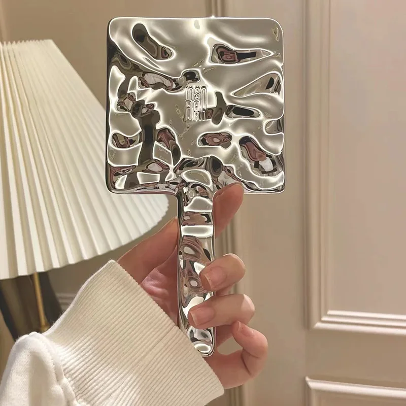

Ins Fashion Hot Seller Water Wave Flawless ABS Handheld Makeup Cosmetics Mirror Personalized Label