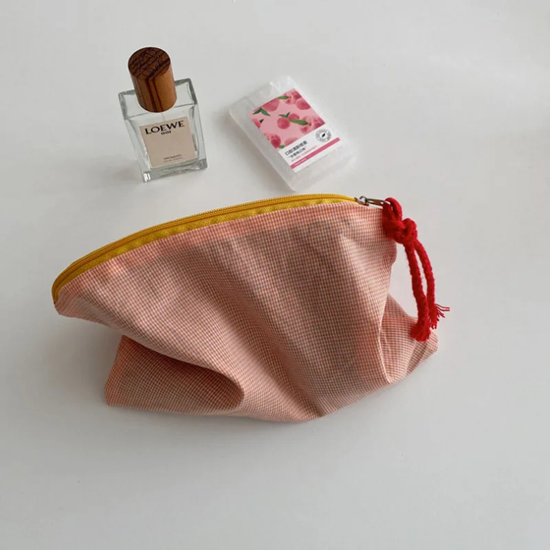 

Ins Style Large Capacity Orange White Portable Travel Makeup Wholesale Cosmetic Wash Storage Bag
