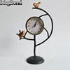 Cast Iron bird on branch antique desk & table clocks for decoration