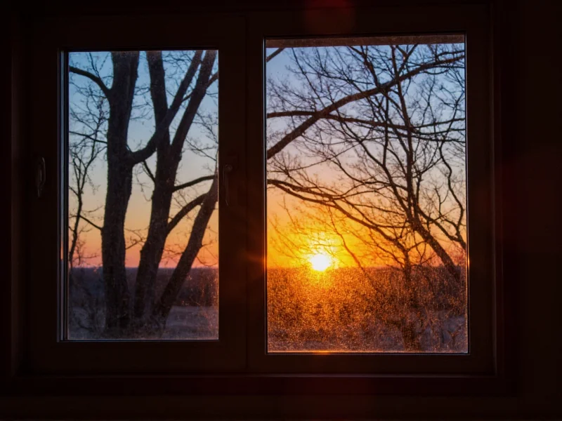 DIY solar window picture glowing at dusk with nature design