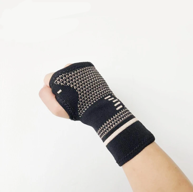 

Lightweight Compression Wrist Brace for All Day Support of Carpal Tunnel Arthritis Tendonitis Copper Wrist and Hand Sleeve