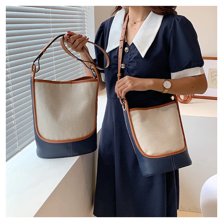

Contrasting color canvas bucket female summer large-capacity 2021 summer new female bag shoulder bag messenger bag