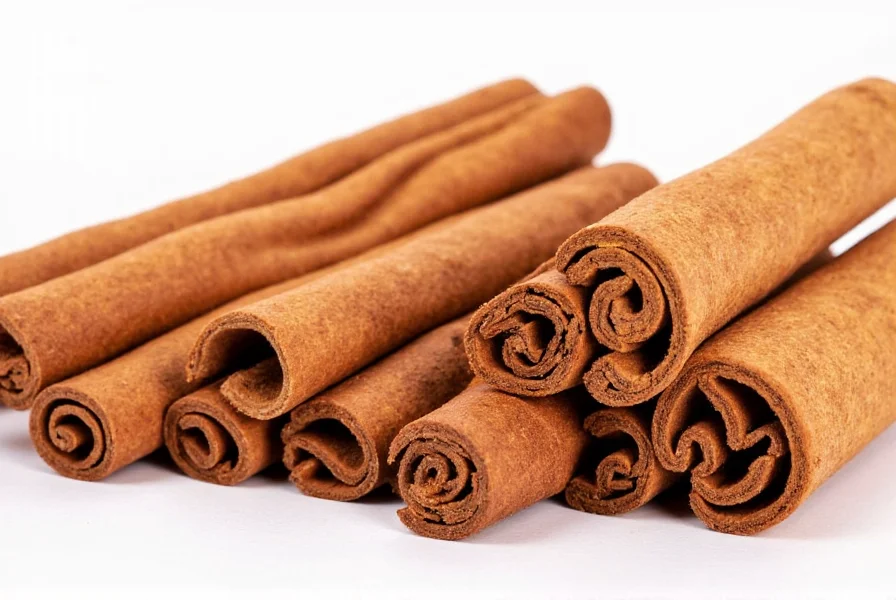 Cinnamon sticks and ground cinnamon in a bowl