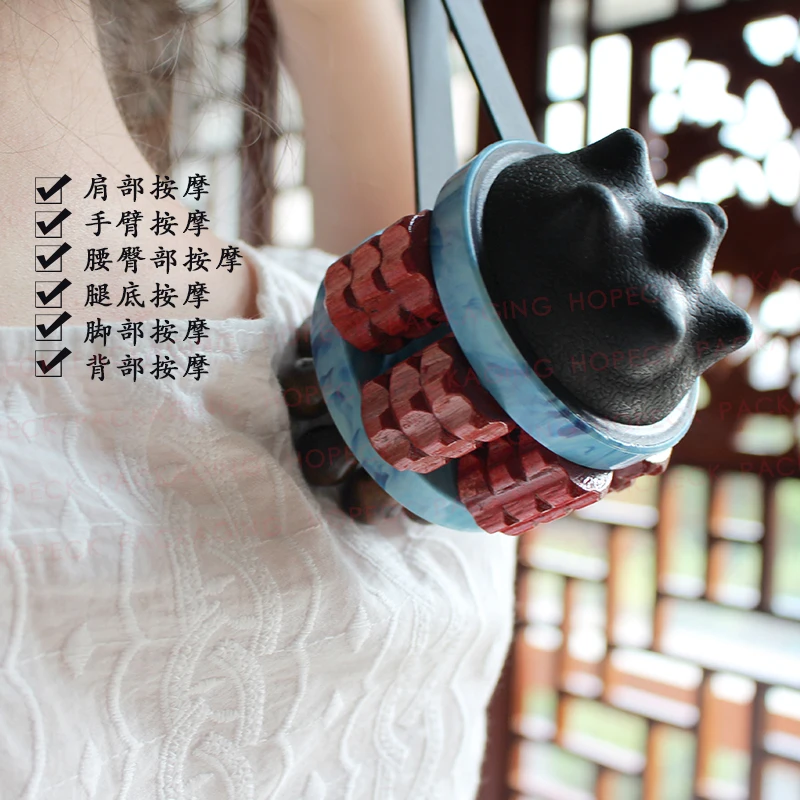 
Multi-functional body massager with plastic blue handle and comb&roller applicator 