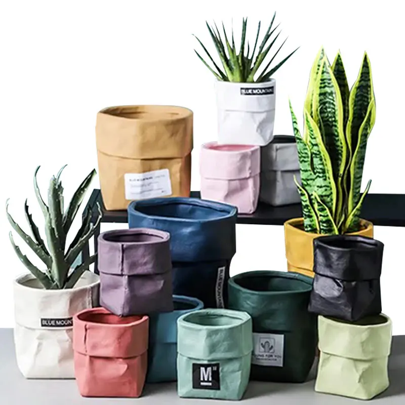 

Redeco 2023 Novelty Ceramic Flower Pots Wholesale Simulation Kraft Paper Bag Design With Drainage Ceramic Planter For Garden Sup