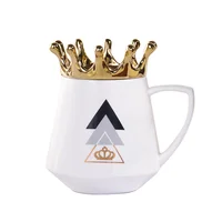 

Creative Cup mobile phone stand ceramic coffee mug with gold crown lid