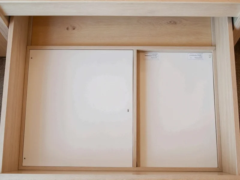 Completed bed base storage compartments with labeled components