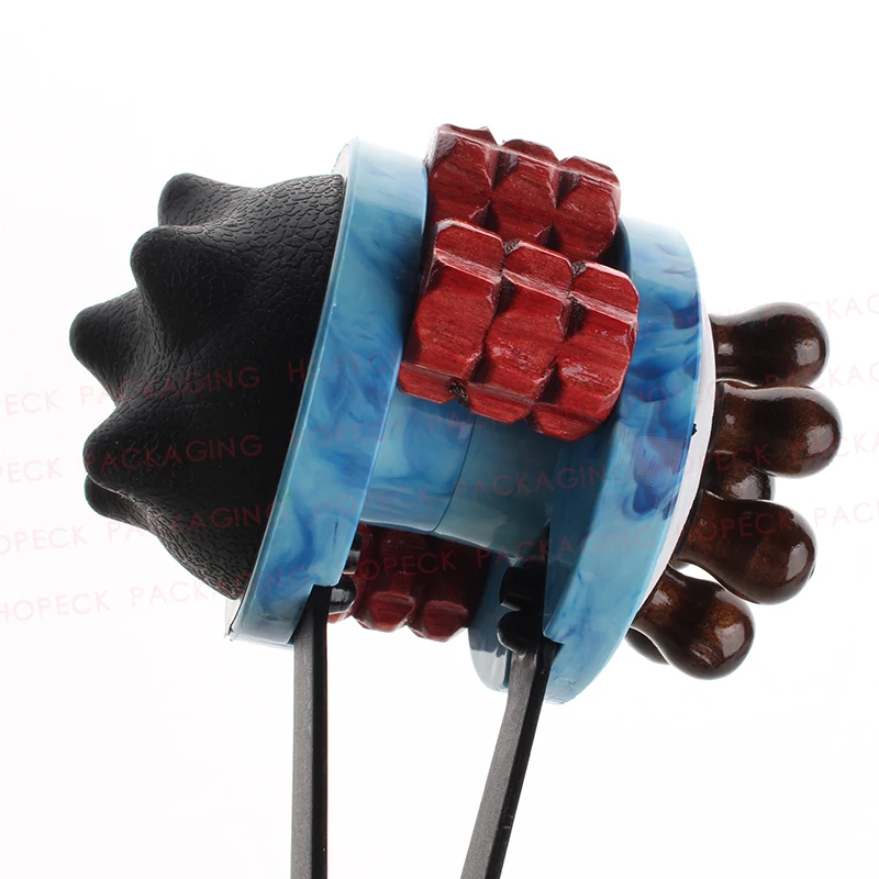 
Multi-functional body massager with plastic blue handle and comb&roller applicator 