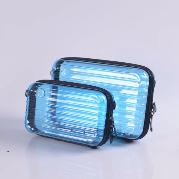 

Hot Selling Custom Hard Shell Mini Waterproof Makeup Pouch Travel Carrying Two Size Clear Custom Color comestic bag set