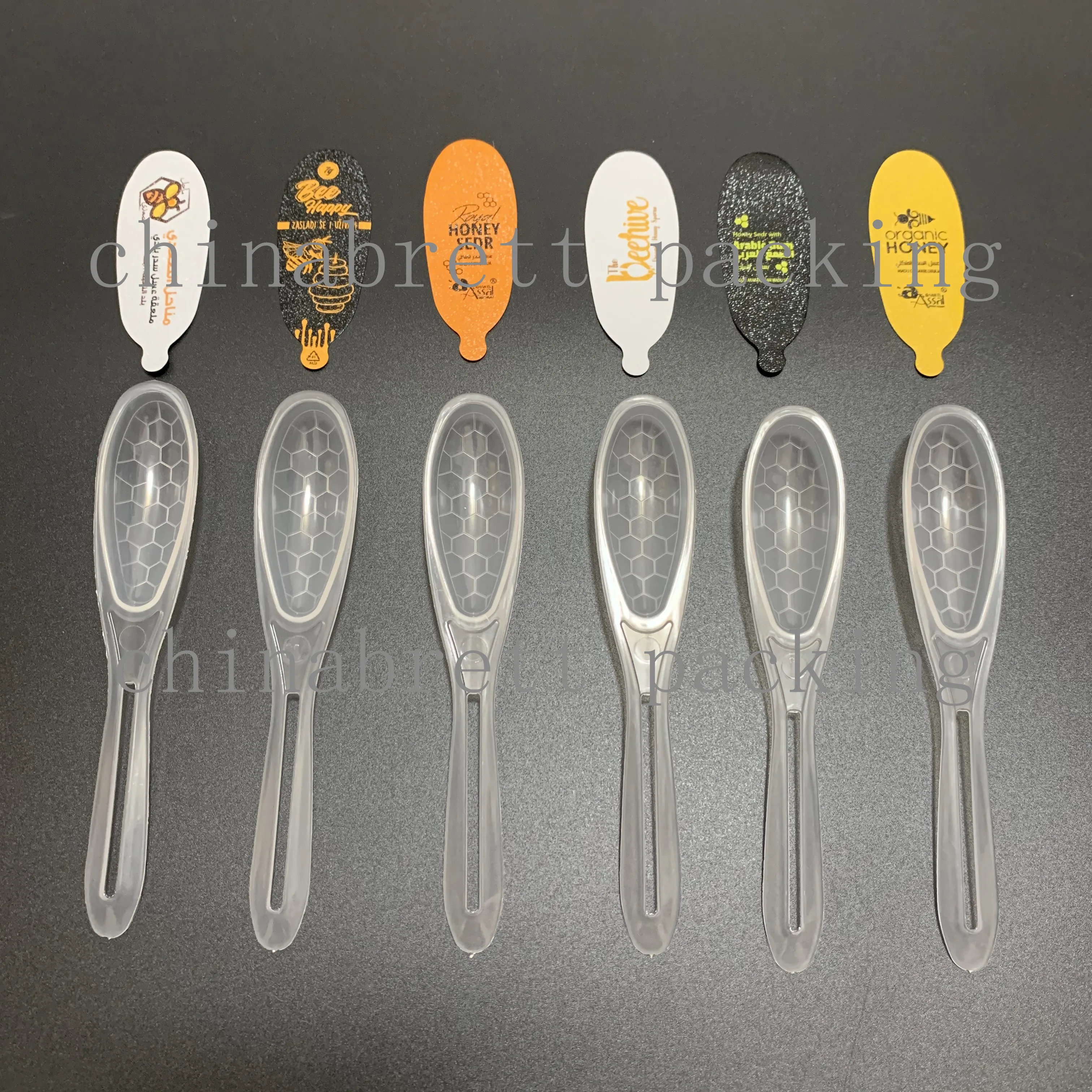 प्लास्टिक पीपी शहद चम्मच मैनुअल सीलिंग मशीन पैकिंग मशीन 46