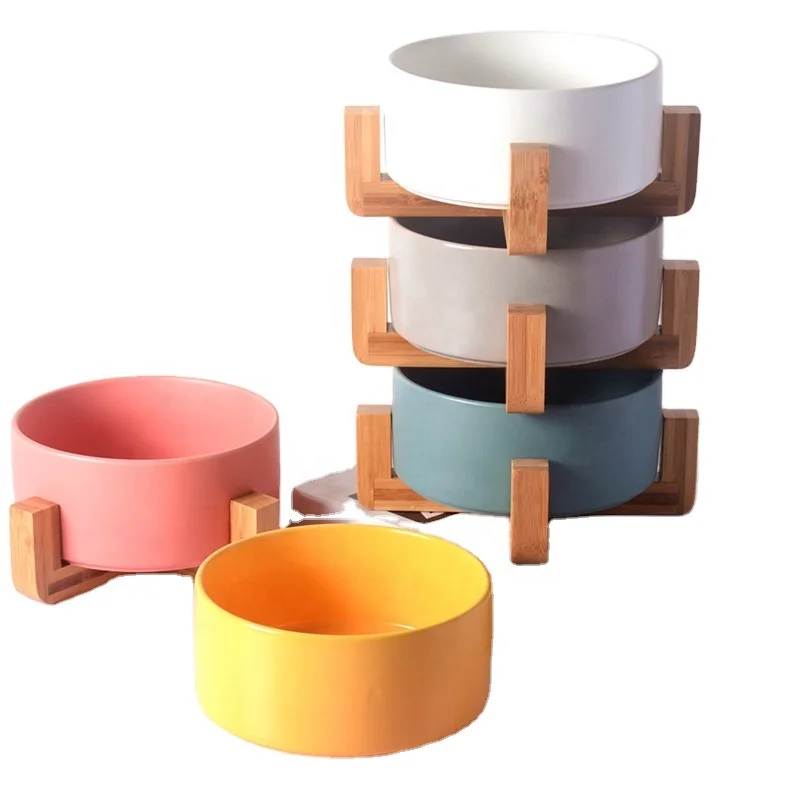 

Colorful Macaron Cat Dog Feeder Ceramic Bowl Dog Food Bowl With Cross Shape Wooden Frame, Like the picture
