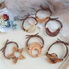 Wholesale Korean Women Vintage Hair Accessories Geometric Star Moon Braided Straw Elastic Hair Band Hair Tie