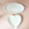 /product-detail/-milu-ceramic-white-hollow-out-cake-plate-love-heart-disk-biaural-carved-ceramic-celadon-color-enamel-crackle-glaze-engra-tray-62226016990.html