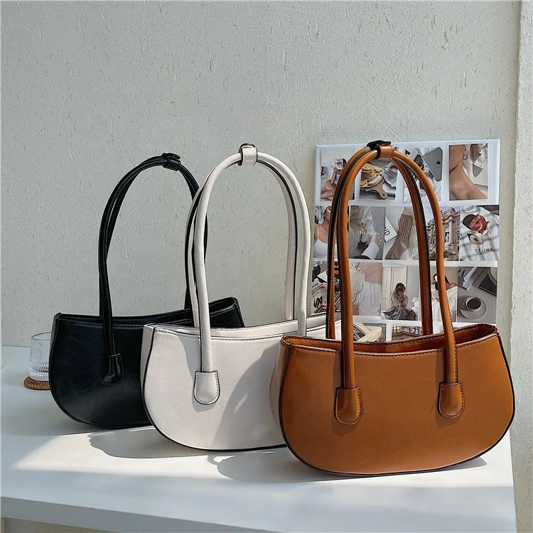 

Korean fashion ladies elegant temperament handbags pure color simple PU shoulder bag irregular retro popular underarm bag