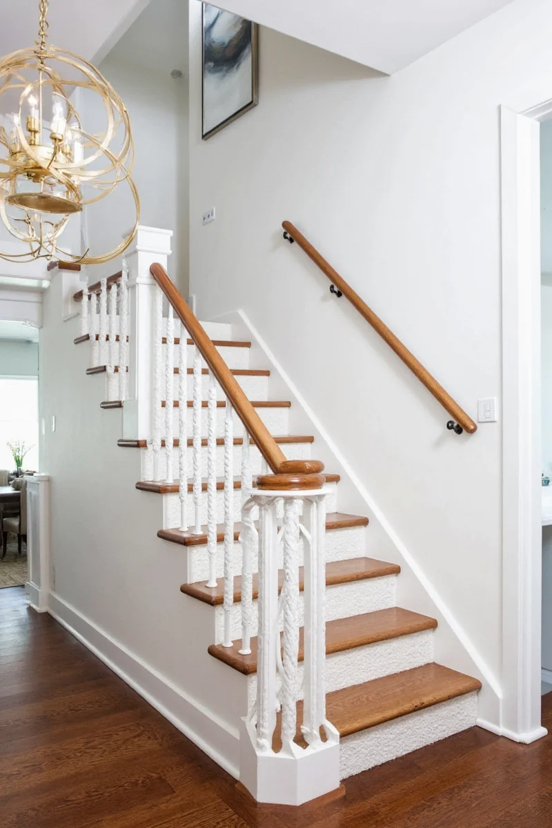 Painted step numbers on wooden stairs