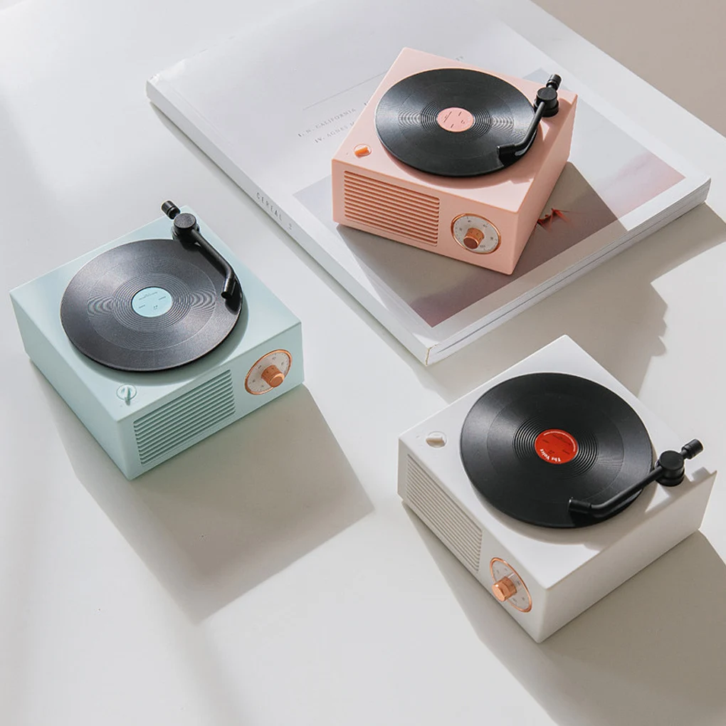 

Vinyl record player Portable speaker wireless mini Stereo portable small steel gun multi-function vinyl record USB speaker