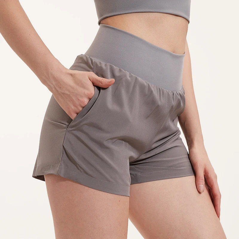 

Women Summer Loose Quick Dry Athletic Sports Fitness Shorts with Pockets Base Layer Custom Running Sports Shorts For Women