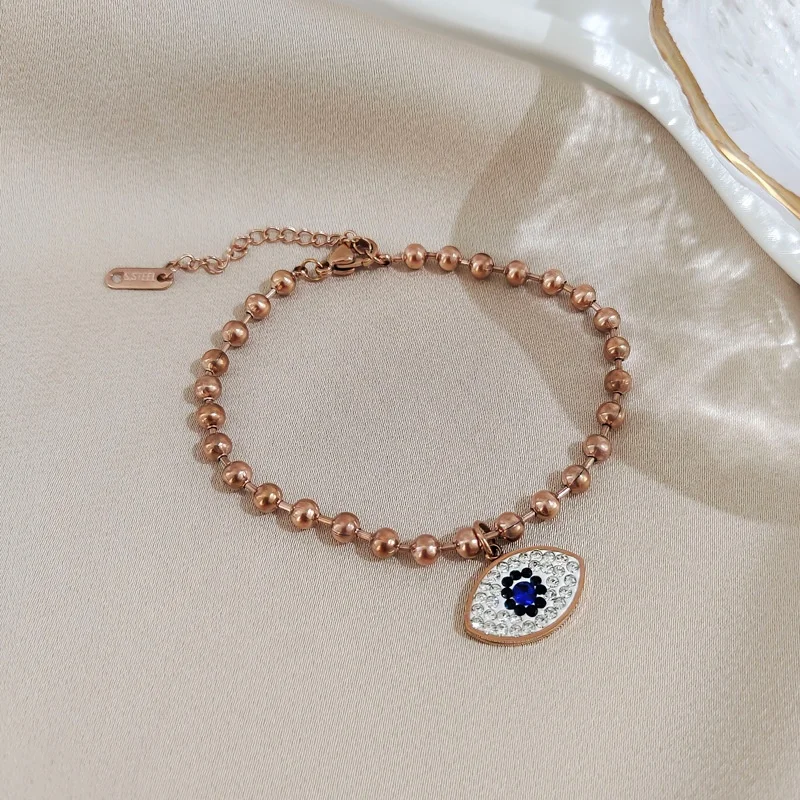 

Free Shipping Jewelry Blue Evil Eyes Plated Rose Gold 316L Stainless Steel Beads Bracelet