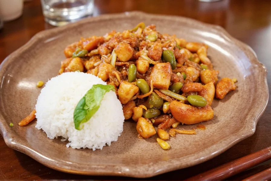 Ginger Red Asian Bistro signature dish featuring ginger-marinated salmon with red pepper reduction