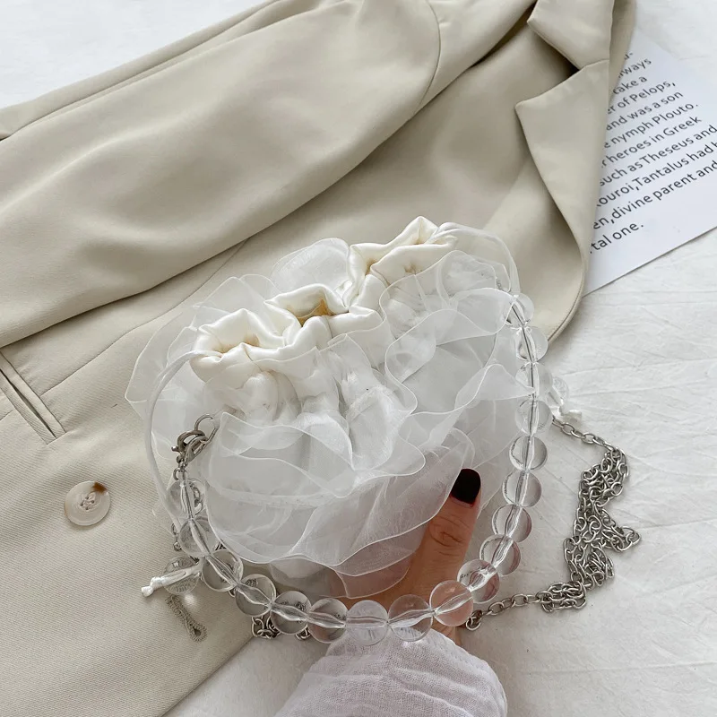 

2021 New pearl chain mesh rope bucket shoulder bag wholesale girls shopping purse and phone handbags, White