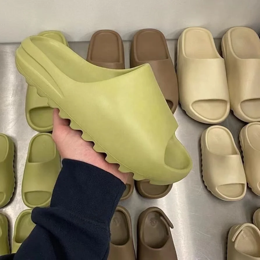 

Wholesale Unisex Nude Yeezy Slides Brown Yeezy Slides Solid Color Green Yeezy Slides, All color available