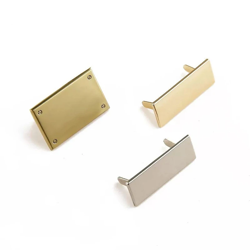 

Environmental Custom Brand Metal Logo Tag Clothing Sewing Labels for Garment / Swimwear/ for bag accessories logo tag