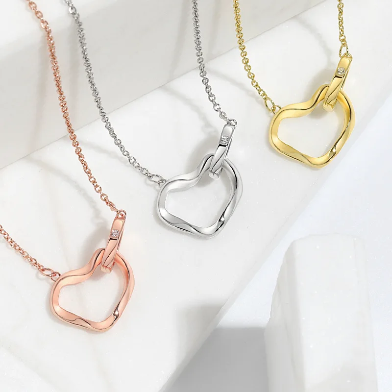 

Best Selling 18K Gold Plated Irregular Heart Pendant Necklace FaShion Crystal Hollow Heart Necklace For Party