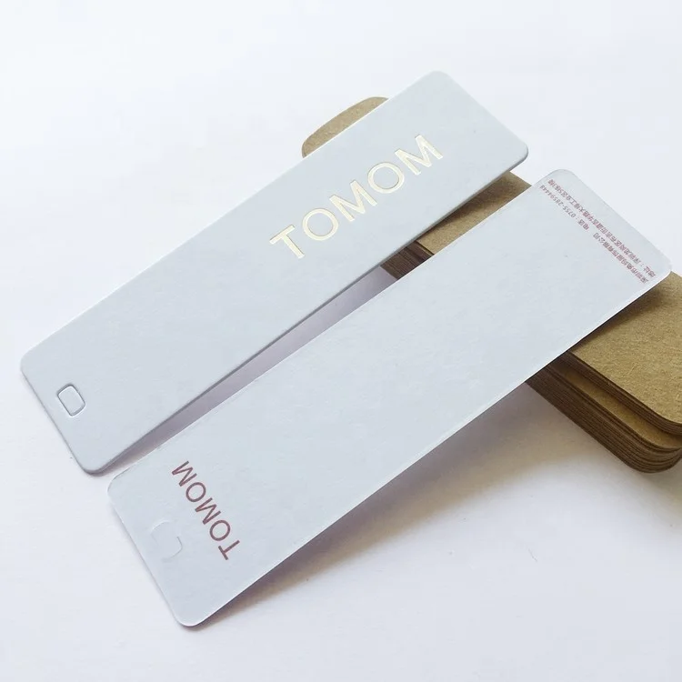 

Custom Luxury white cardboard paper hang tag with gold logo swing tag for garment, Customized color