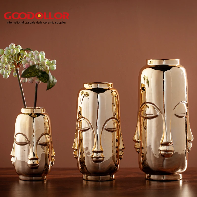 

Factory direct Nordic decorative decorative pieces golden face vases ceramic electroplating vases creative flower arrangement