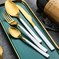 

Stainless steel cutlery includes spoon fork knife with golden handle and bark texture design flatware