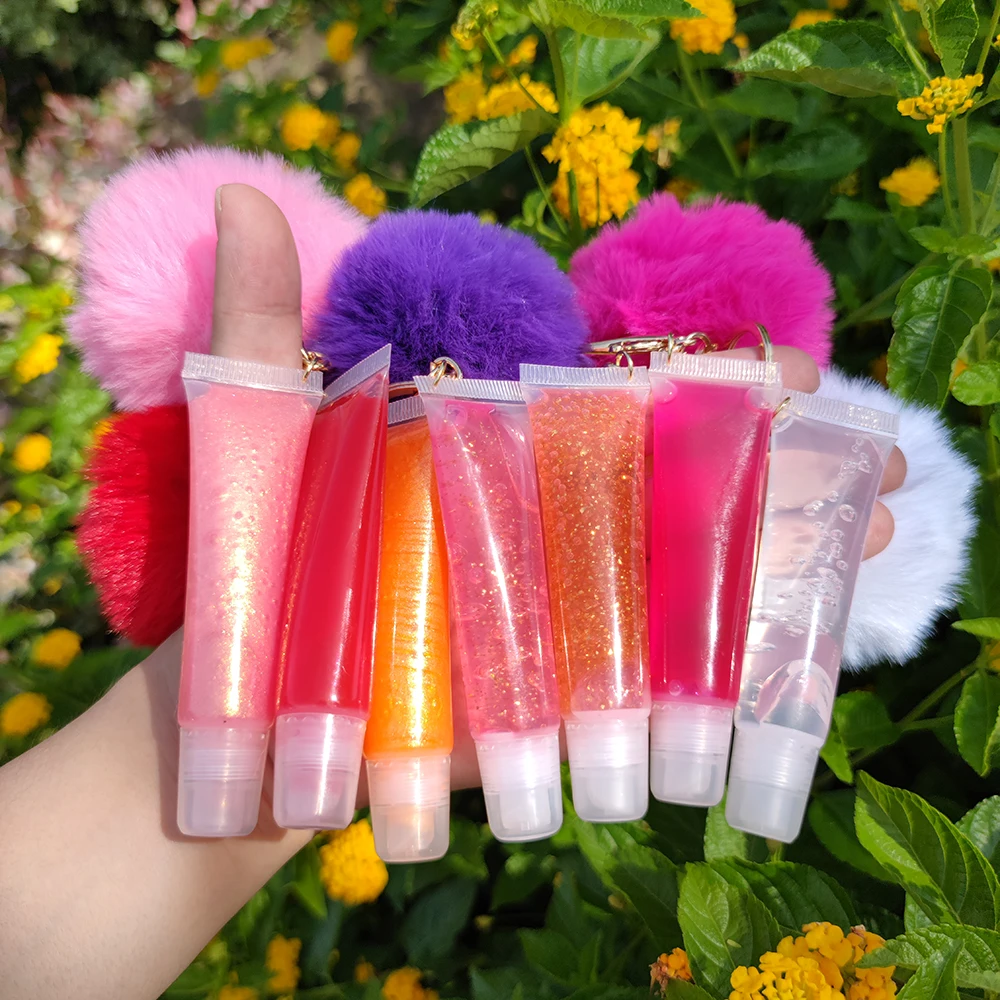 

Novel design fruity flavor hose tube lip gloss with ball shape plush toy moisturizing sexy emollient makeup lip glaze, Customization welcome