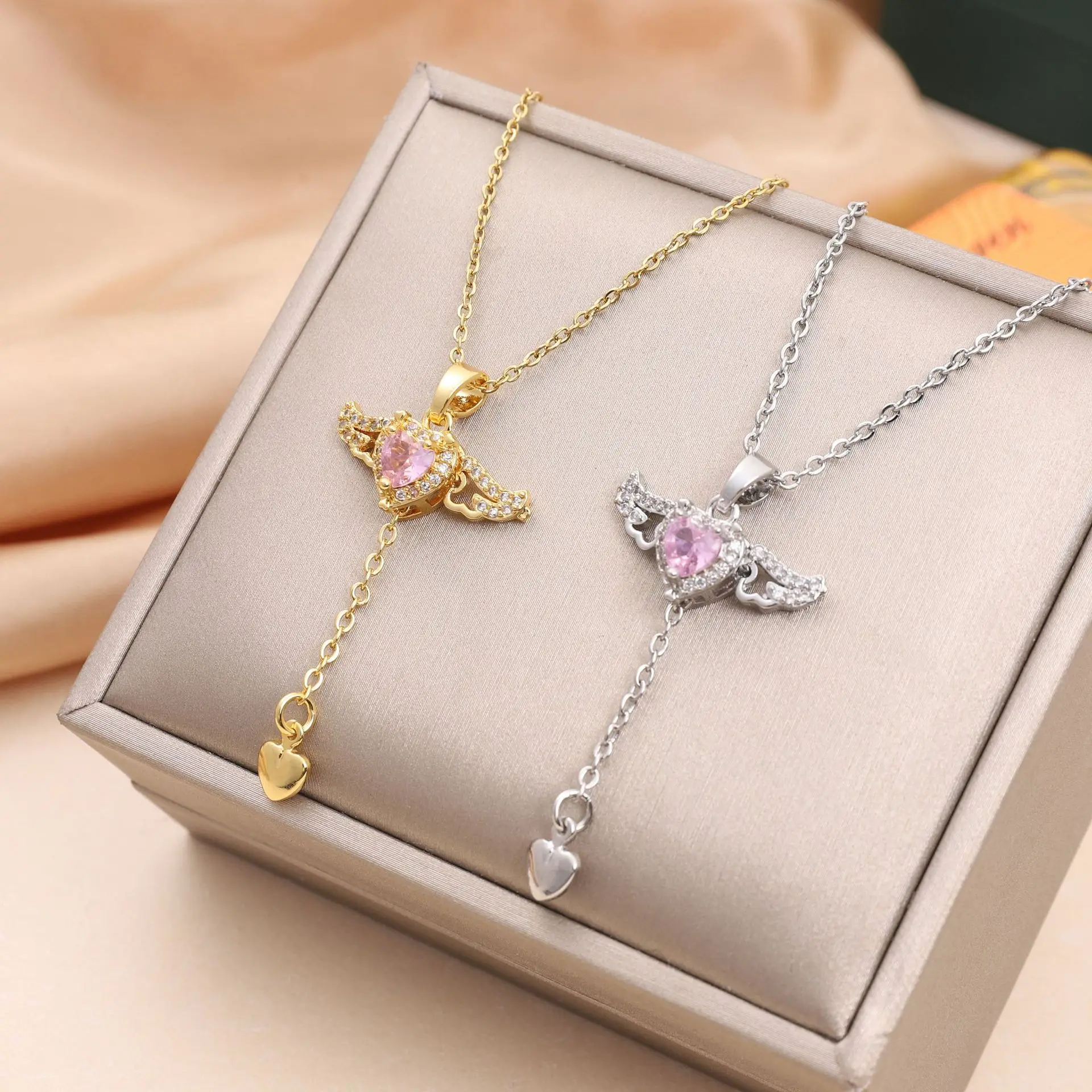 

2023 New Arrivals White Pink Rhinestone Necklace Heart Stainless Steel Necklace Movable Cupid's Angel Wing Pendant Necklace